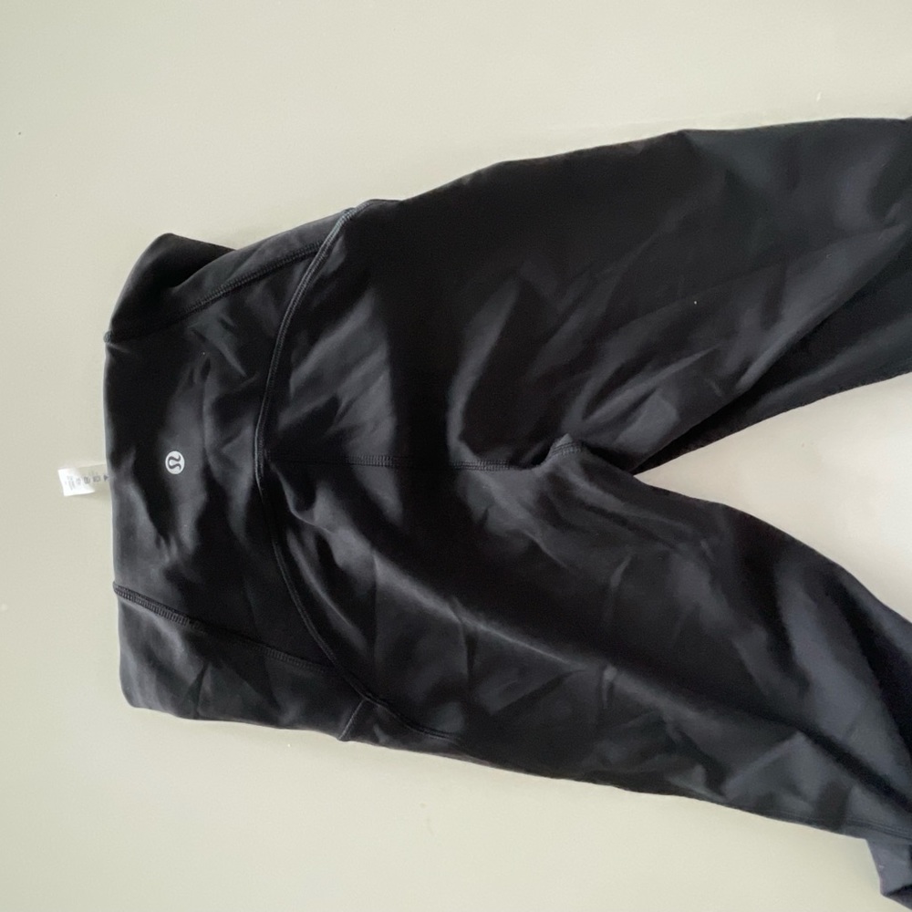 Lululemon capris with mesh details on the outer side of the left and right calf